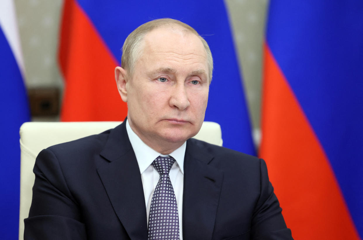 President Vladimir Putin signed a decree last Wednesday to launch temporary procedures and give the government 10 days to choose banks to handle payments under a new scheme. (Kremlin via Reuters)