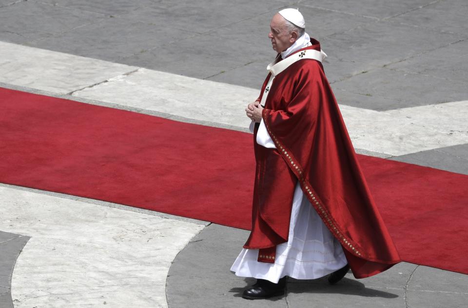 Pope Francis walks after celebrating a Pentecost Mass in St. Peter's Square, at the Vatican, Sunday, June 9, 2019. The Pentecost Mass is celebrated on the seventh Sunday after Easter. (AP Photo/Gregorio Borgia)