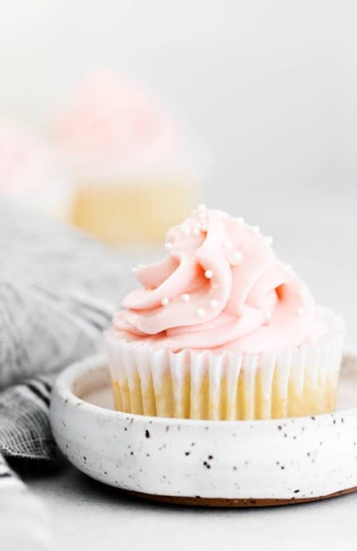 <p>Hot Eats and Cool Reads</p><p>Vanilla cupcakes with homemade rhubarb jam and rhubarb buttercream.</p><p><strong>Get the recipe: <a href="https://www.hoteatsandcoolreads.com/2021/05/homemade-rhubarb-jam-filled-vanilla.html#more" rel="nofollow noopener" target="_blank" data-ylk="slk:Rhubarb Jam Filled Cupcakes;elm:context_link;itc:0;sec:content-canvas" class="link rapid-noclick-resp">Rhubarb Jam Filled Cupcakes</a></strong></p>