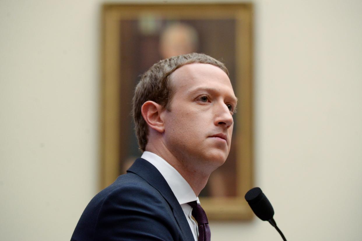 FILE PHOTO: Facebook Chairman and CEO Mark Zuckerberg testifies at a House Financial Services Committee hearing in Washington, U.S., October 23, 2019. REUTERS/Erin Scott