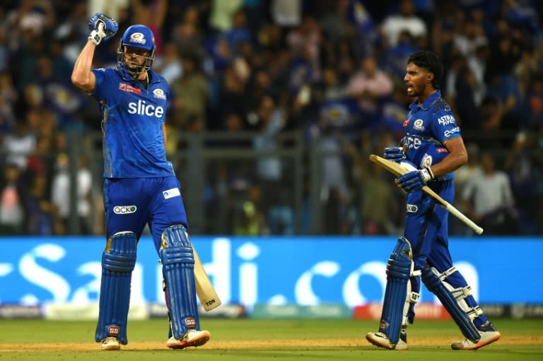 Dramatic finish: Mumbai Indians' Tim David and Tilak Varma celebrate their win