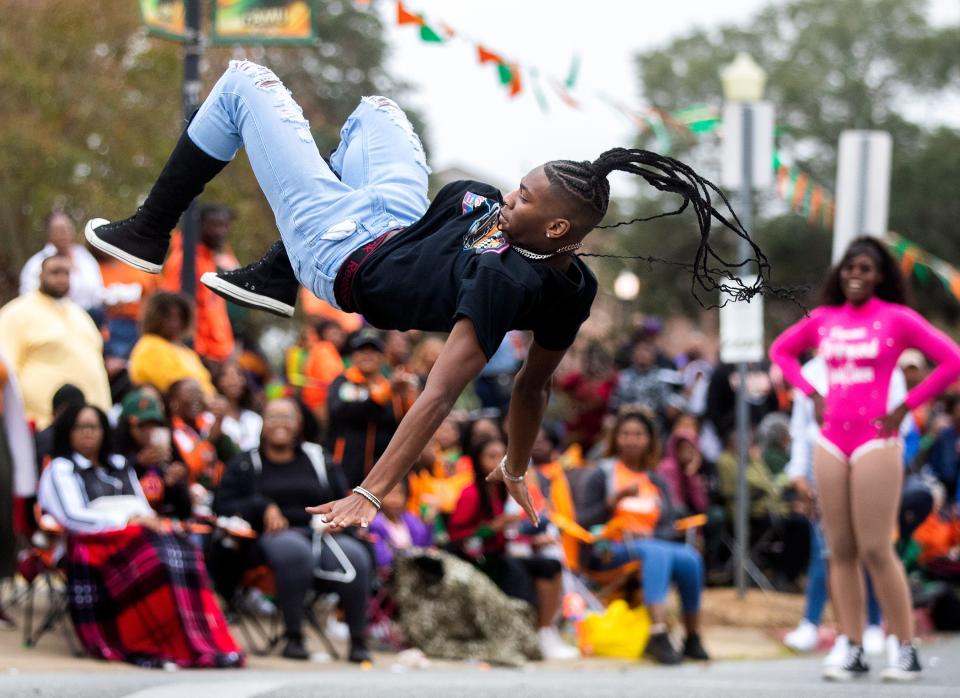 A dancer performs in the annual FAMU homecoming parade on Saturday, Oct. 29, 2022 in Tallahassee, Fla. 