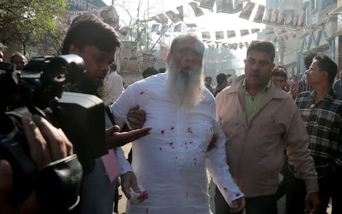 Salahuddin Ahmed, a candidate for the Bangladesh Nationalist Party, the largest single party in the opposition alliance, was stabbed in Dhaka as the election unfolded - Credit: Reuters