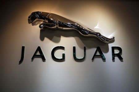 The Jaguar logo is pictured at a Jaguar Land Rover showroom in Mumbai February 13, 2013. REUTERS/Vivek Prakash/File Photo