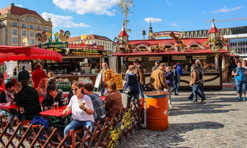 Germans enjoy traditional sausages and meat products at a spring market in Dresden, but consumption of meat in the country is going down.