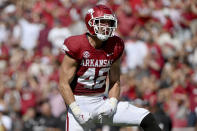 FILE - Arkansas linebacker Drew Sanders (42) celebrates after making a big play against Cincinnati during the first half of an NCAA college football game Saturday, Sept. 3, 2022, in Fayetteville, Ark. Sanders was selected to The Associated Press All-America team released Monday, Dec. 12, 2022.(AP Photo/Michael Woods, File)