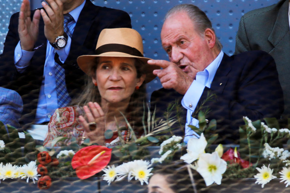 Tennis - Madrid Open - Rafael Nadal of Spain v Andrey Kuznetsov of Russia - Madrid, Spain - 3/5/16 Spain's former King Juan Carlos talks to his daughter Infanta Elena. REUTERS/Sergio Perez