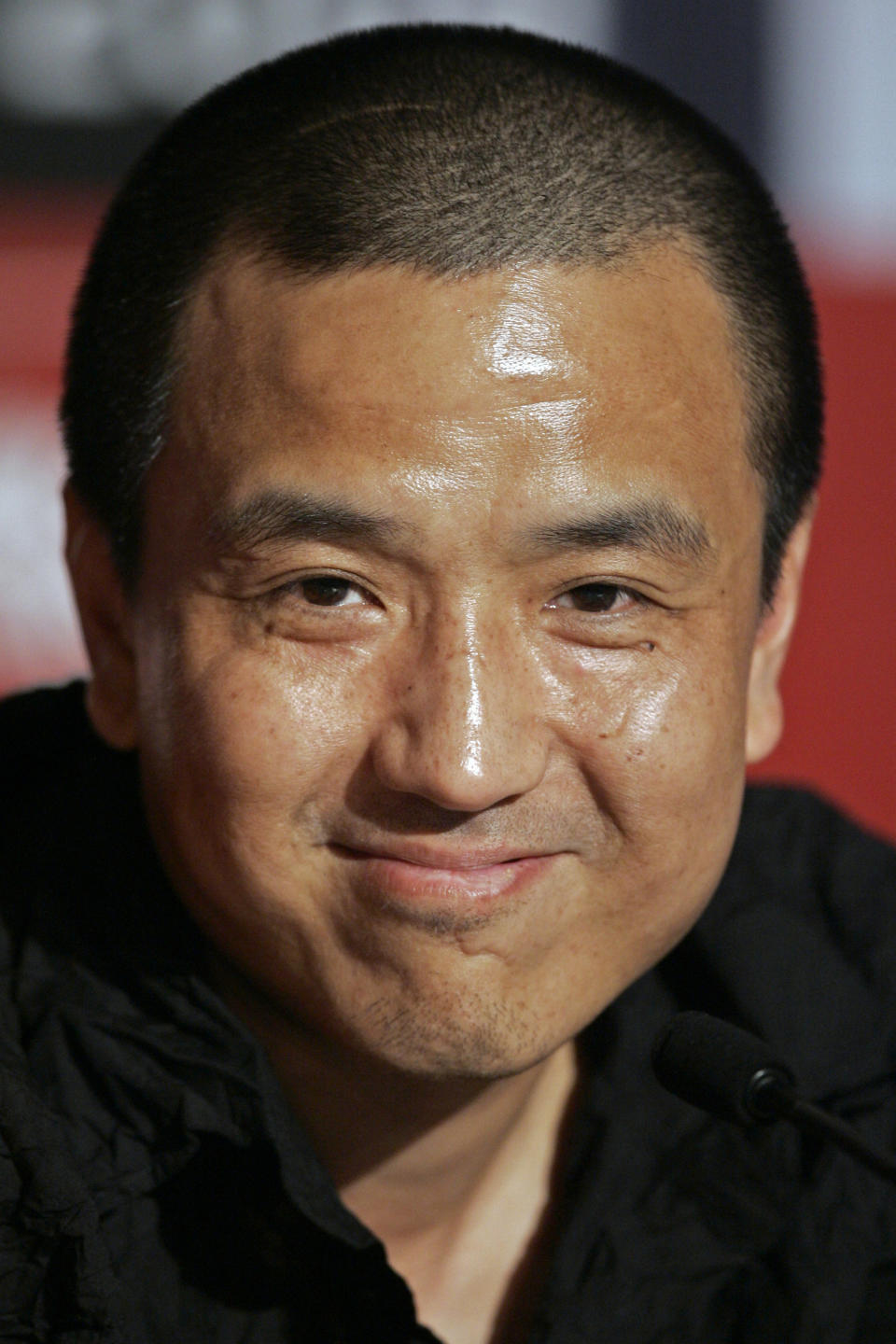 FILE - In this May 14, 2009 file photo, Chinese director Lou Ye smiles during a press conference at the 62nd International Cannes Film Festival in Cannes, southern France. Lou's new dark melodrama titled "Mystery" is heading the list of entries in the best film category at Taiwan's 49th Golden Horse Film festival - the Chinese-language Oscars - catapulting the mainland cinema to center stage at this Nov. 24 2012 event. (AP Photo/Lionel Cironneau/File)
