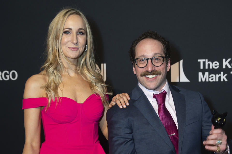 Nikki Glaser and Ian Fidance arrive on the red carpet for the 24th Annual Mark Twain Prize for American Humor at the Kennedy Center for the Performing Arts, Sunday, March 19, 2023, in Washington. (AP Photo/Kevin Wolf)