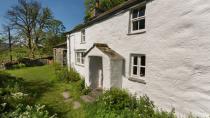 <p>This rustic farmhouse is remote and in the most peaceful of places for a Christmas cottage that feels a world away from the hustle and bustle. You’ll be tucked away among the fells and streams of the Duddon Valley, where access to the house is through working farmland and across a wooden footbridge. Inside reveals a classic farmhouse interior with slate floors, low beamed ceilings and dark wooden floorboards.</p><p><strong>Be sure to... </strong>Explore the Duddon Valley for walking straight from your doorstep. The majestic countryside of Tarn Hows and Coniston are a 40-minute drive away. </p><p><strong>Sleeps: </strong>5</p><p><strong>Pets:</strong> No</p><p><strong>Price: </strong>£899 for 7 nights over Christmas and New Year (short breaks can be booked one month before for peak periods)</p><p><a class="link " href="https://go.redirectingat.com?id=127X1599956&url=https%3A%2F%2Fwww.nationaltrust.org.uk%2Fholidays%2Fthrang-lake-district&sref=https%3A%2F%2Fwww.redonline.co.uk%2Ftravel%2Finspiration%2Fg33891719%2Fchristmas-cottage%2F" rel="nofollow noopener" target="_blank" data-ylk="slk:FIND OUT MORE;elm:context_link;itc:0;sec:content-canvas">FIND OUT MORE</a></p>