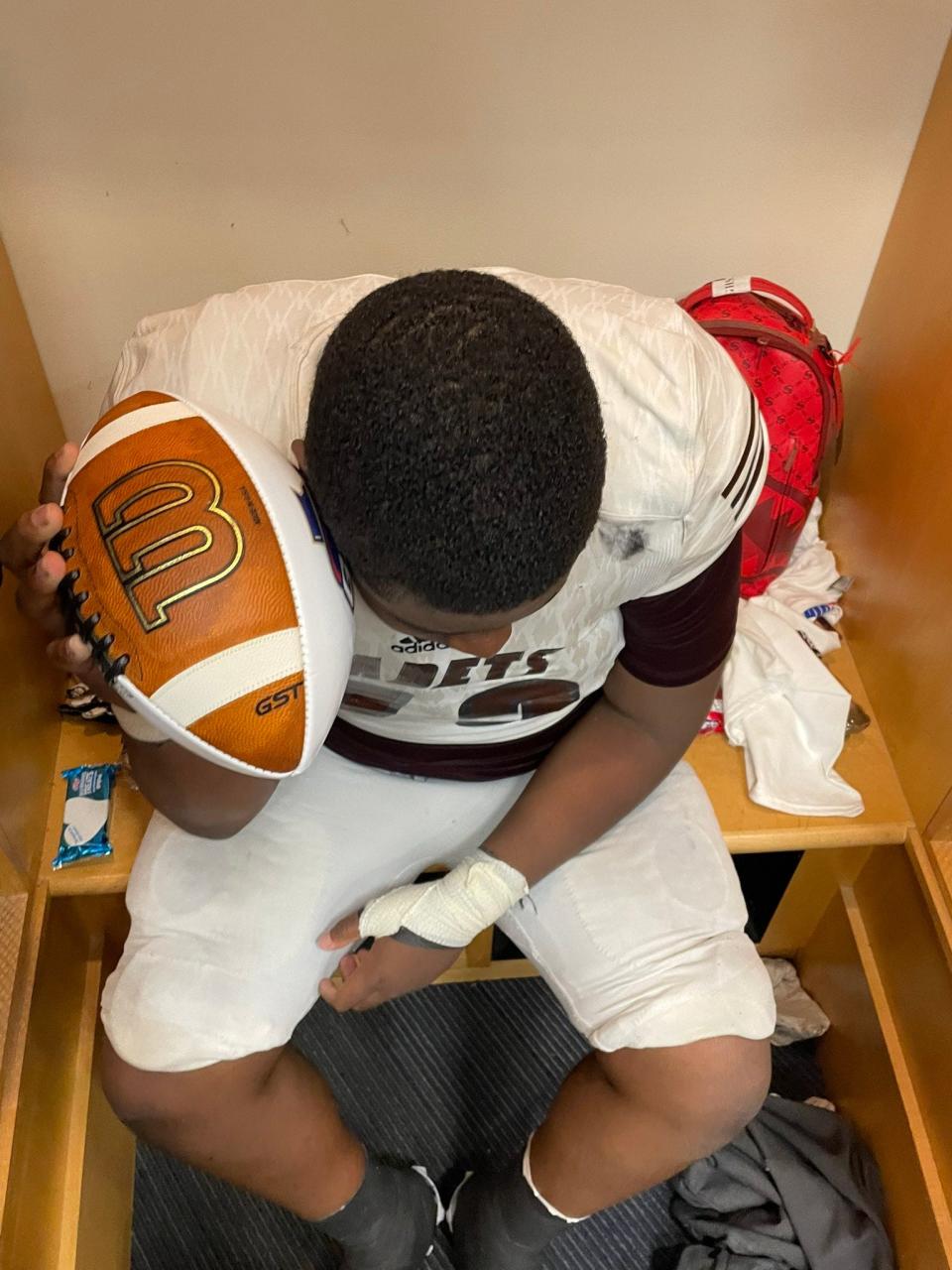 Benedictine's Jacobe Ward in the locker room after the Cadets beat Cedartown to win the 2022 Class 4A state title.