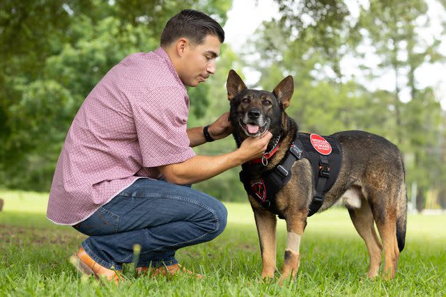 <p>Callynth Photography/American Humane</p> Sgt. Isaac Weissend with Poker