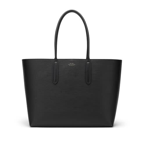 <p><a href="https://go.redirectingat.com?id=74968X1596630&url=https%3A%2F%2Fwww.smythson.com%2Fus%2Fblack-east-west-tote-bag-in-panama-1029480.html&sref=https%3A%2F%2Fwww.townandcountrymag.com%2Fstyle%2Ffashion-trends%2Fg45107556%2Fbest-black-leather-tote-bags%2F" rel="nofollow noopener" target="_blank" data-ylk="slk:Shop Now;elm:context_link;itc:0;sec:content-canvas" class="link ">Shop Now</a></p><p>East West Tote Bag in Panama</p><p>smythson.com</p><p>$1095.00</p>