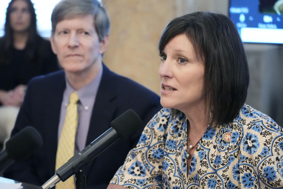 Mississippi House Medicaid Committee Chairman Rep. Missy McGee, R-Hattiesburg, right, expresses her disappointment that the state Senate conferees did not attend a meeting to discuss their legislative bodies plans for the cost of Mississippi Medicaid expansion at a public legislative conference committee meeting at the Mississippi State Capitol, Thursday, April 25, 2024. (AP Photo/Rogelio V. Solis)