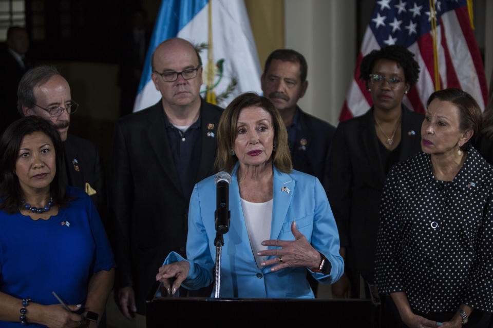 FILE - In this Aug. 8, 2019, file photo, House Speaker Nancy Pelosi gives a news conference at the Air Force Base in Guatemala City. There’s an American leader whose words increasingly resonate abroad, who’s adored in foreign capitals and who sends a message just by her arrival. House Speaker Nancy Pelosi has emerged as an alternative ambassador in the Trump era. (AP Photo/Oliver de Ros, File)