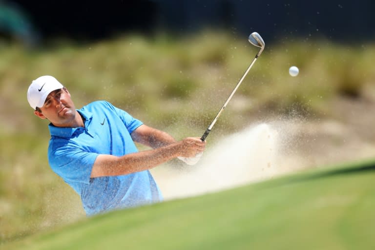 World number one Scottie Scheffler of the United States blasts out of bunker on the 15th hole during a practice round for the 124th US Open at Pinehurst (Andrew Redington)