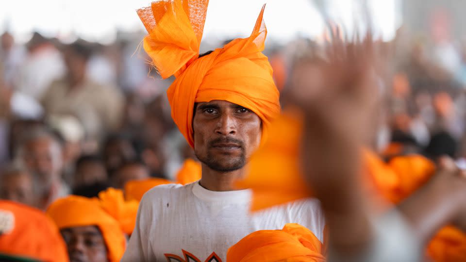 A Modi supporter at his rally in Aligarh, India, on April 22, 2024. - John Mees/CNN