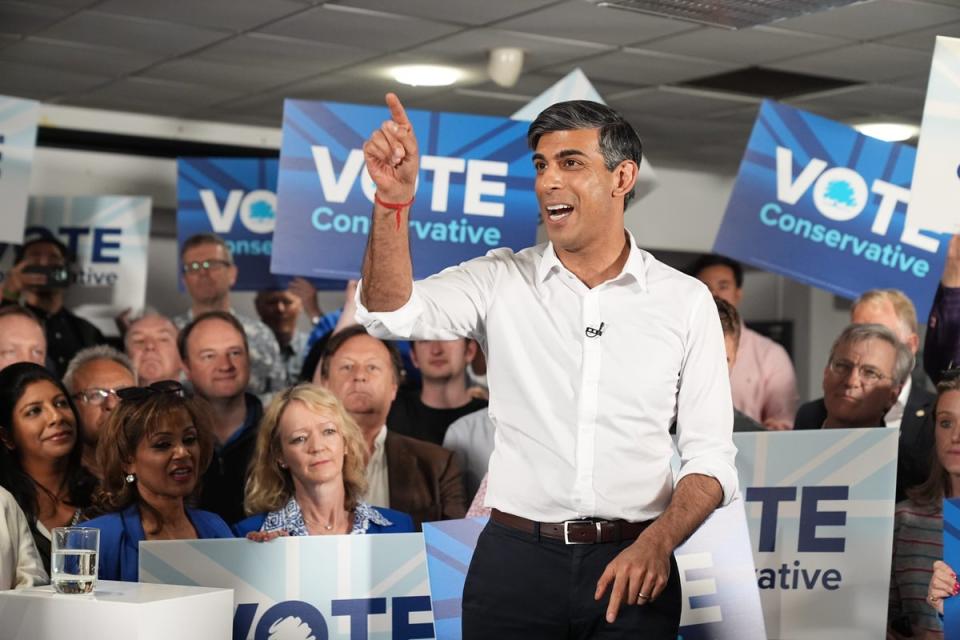 Prime minister Rishi Sunak speaks during his visit to Amersham and Chiltern RFC during his 2024 general election campaign (PA Wire)