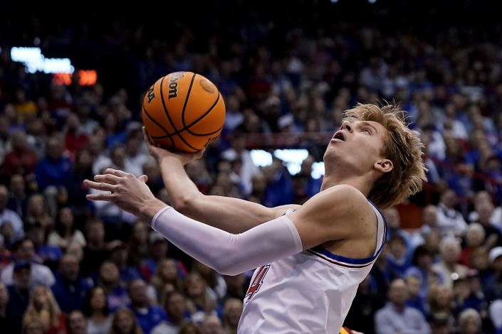 Kansas guard Gradey Dick shoots during the first half of an NCAA college basketball game against Iowa State Saturday, Jan. 14, 2023, in Lawrence, Kan. (AP Photo/Charlie Riedel)