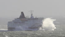 The DFDS Calais Seaways crashes through waves as high winds continue to effect ferry services at The Port of Dover in Kent. (PA)