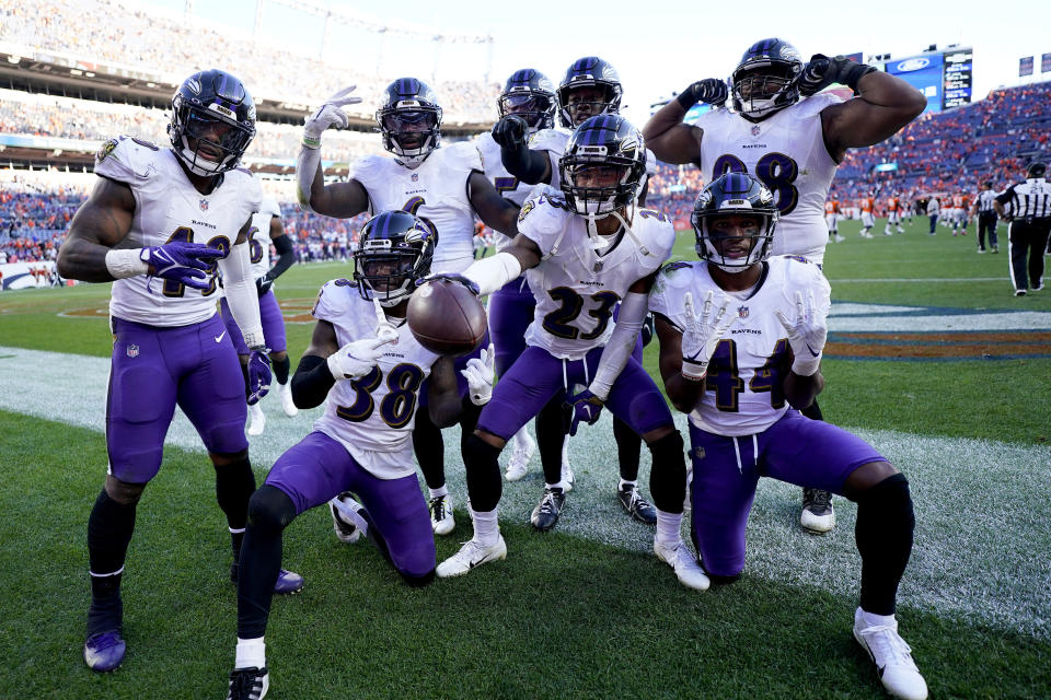 Baltimore Ravens cornerback Anthony Averett (23) celebrates in interception in the end zone against the Denver Broncos during the second half of an NFL football game, Sunday, Oct. 3, 2021, in Denver. (AP Photo/Jack Dempsey)