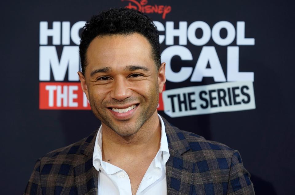 Corbin Bleu poses at the Season 3 premiere of the Disney+ series "High School Musical: The Musical: The Series" on July 27, 2022, in Burbank, Calif.