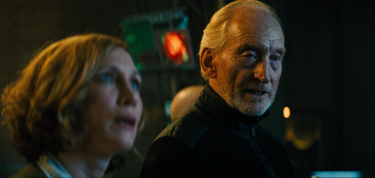 L-R) VERA FARMIGA as Dr. Emma Russell and CHARLES DANCE as Alan Jonah in Warner Bros. Pictures’ and Legendary Pictures’ action adventure “GODZILLA: KING OF THE MONSTERS,” a Warner Bros. Pictures release. 