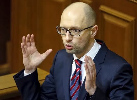 Ukraine's Prime Minister Arseny Yatseniuk delivers a speech during a parliament session in Kiev, Ukraine, February 16, 2016. REUTERS/Gleb Garanich