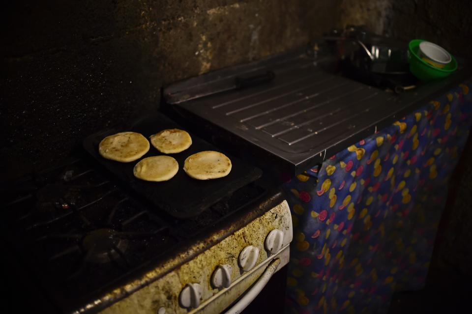 Four arepas (food made with corn) for a family are pictured in the kitchen of a house in the poor neighborhood of Gramoven, Caracas, on June 2, 2016. Shortages of basic goods have fueled looting, violent crime and vigilante justice. At least 94 looting sprees broke out in the first four months of the year, according to the Venezuelan Observatory for Social Conflict. Venezuela, home to the world's largest oil reserves, has been hit hard by the collapse in global crude prices over the past two years.