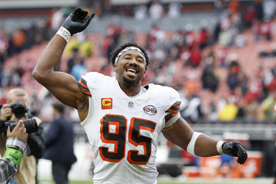 Cleveland Browns defensive end Myles Garrett (95) celebrates as he leaves the field after an NFL football game against the San Francisco 49ers Sunday, Oct. 15, 2023, in Cleveland. (AP Photo/Ron Schwane)