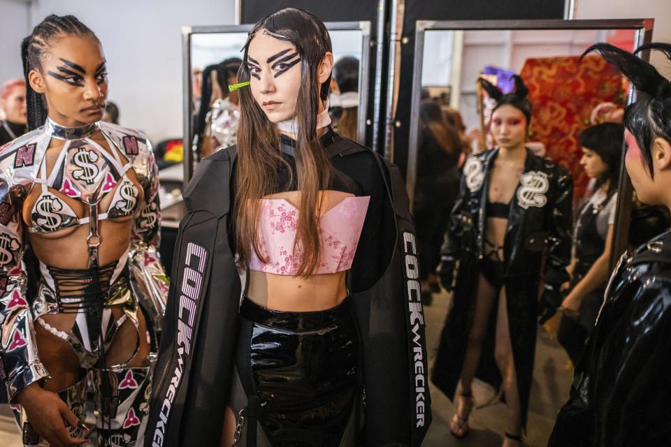 Models wait backstage before the Namilia fashion show at Pier 59 Studios during NYFW Fall/Winter 2020 on Sunday, Feb. 9, 2020, in New York. (Photo by Charles Sykes/Invision/AP)