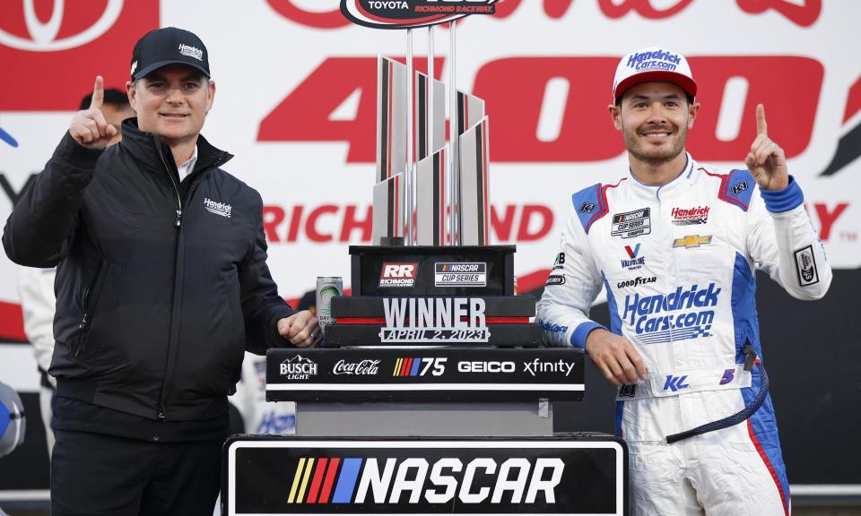 RICHMOND, VIRGINIA - APRIL 02: Kyle Larson, driver of the #5 HendrickCars.com Chevrolet, and Jeff Gordon, Vice Chairman of Hendrick Motorsports celebrate in victory lane after winning the NASCAR Cup Series Toyota Owners 400 at Richmond Raceway on April 02, 2023 in Richmond, Virginia. (Photo by Jared C. Tilton/Getty Images)