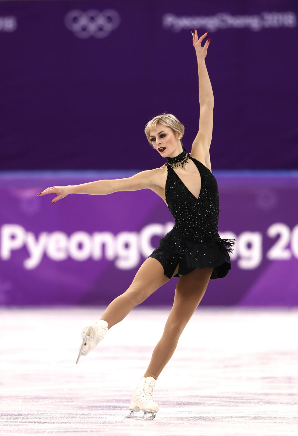 Austman, of Canada, wore this little black dress for her short program during the ladies single event, proving that sometimes, less <i>can&nbsp;</i>be more.&nbsp;We're especially fans of the embellished choker -- a nice touch of drama in an otherwise simple costume.