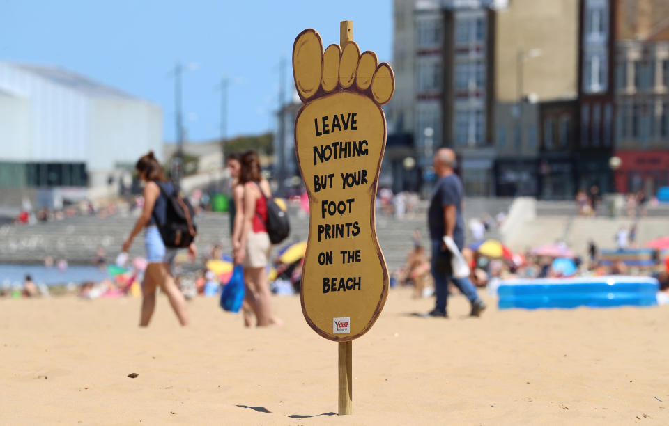 A notice on the beach in Margate, Kent, urges people not leave any litter behind.