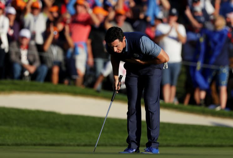 Rory McIlroy takes a bow after an eagle on No. 16. (Getty Images)