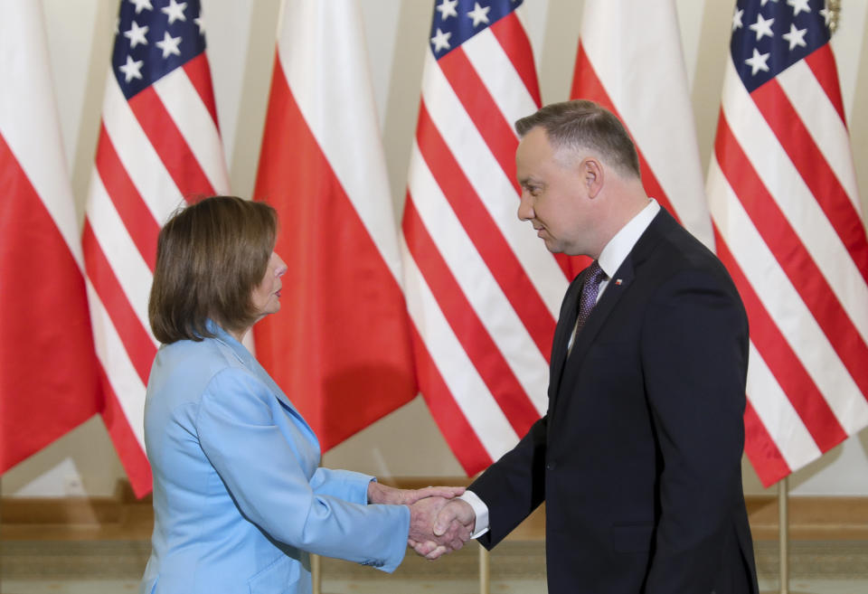 In this photo released by the Office of the President of Poland U.S. Speaker of the House Nancy Pelosi, left, and Poland's President Andrzej Duda shake hands in Warsaw, Poland, Monday, May 2, 2022. (Marek Borawski/Office of the President of Poland)