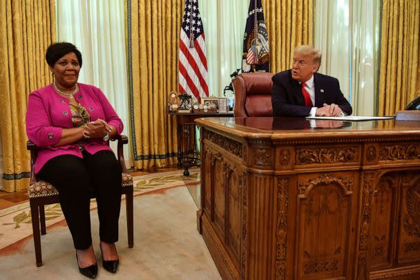 PHOTO: President Donald Trump speaks with Alice Johnson, criminal justice reform advocate and former federal prisoner, in the Oval Office of the White House in Washington, Aug. 28, 2020. (Nicholas Kamm/AFP via Getty Images)