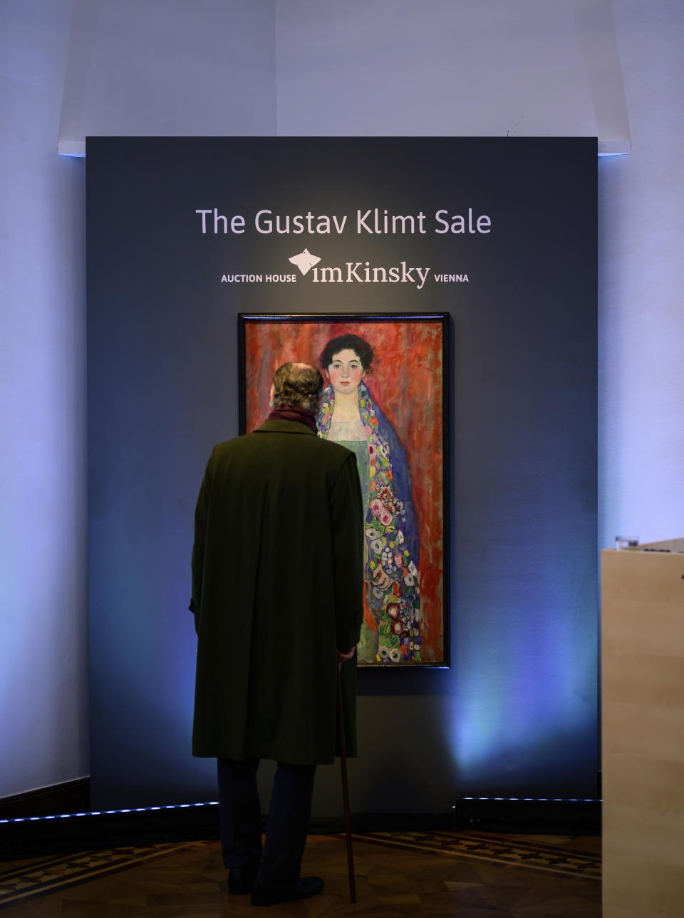 A man looks at the painting 'Portrait of Fräulein Lieser' by Austrian painter Gustav Klimt prior to an auction, in Vienna, Wednesday, April 24, 2024. A portrait of a young woman by Gustav Klimt that was long believed to be lost has been sold at an auction in Vienna for 30 million euros ($32 million). The Austrian modernist artist started work on the “Portrait of Fräulein Lieser” in 1917, the year before he died, and it is one of his last works. (AP Photo/Christian Bruna)