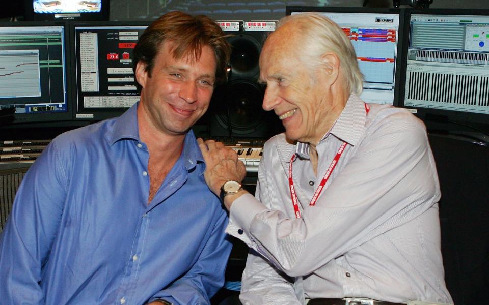 Music director Giles Martin, left, and his father Sir George Martin