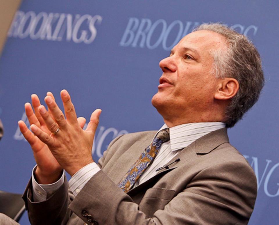 This handout photo provided by the Brookings Institution, and taken on June 25, 2013, shows Health and Human Services Director of the Center for Consumer Information and Insurance Oversight Gary Cohen speaking at the Institution in Washington. Health insurance sign-ups under President Barack Obama’s law have skewed toward an older, costlier crowd. "We think that more and more young people are going to sign up as time goes by," said Cohen. (AP Photo/Brookings Institution, Paul Morigi)