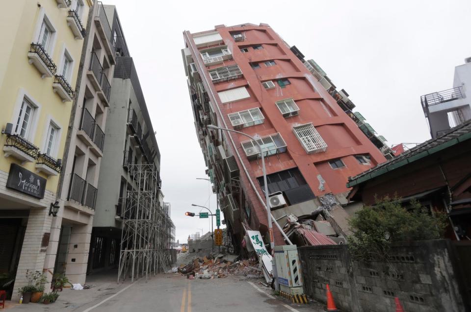A building is seen partially collapsed, two days after a powerful earthquake struck the city, in Hualien City, eastern Taiwan (AP)