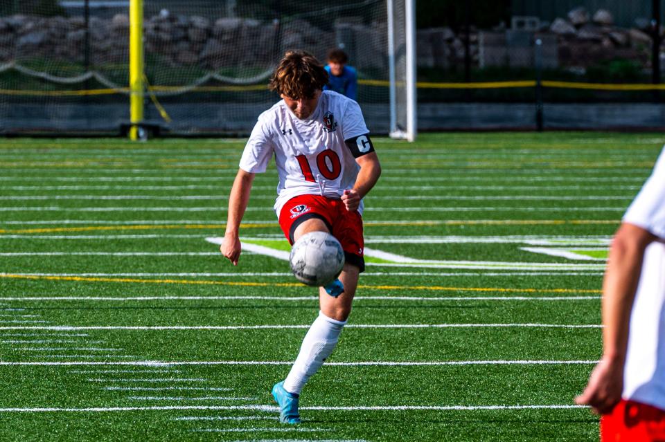 Durfee's Landon Medeiros shoots the ball.