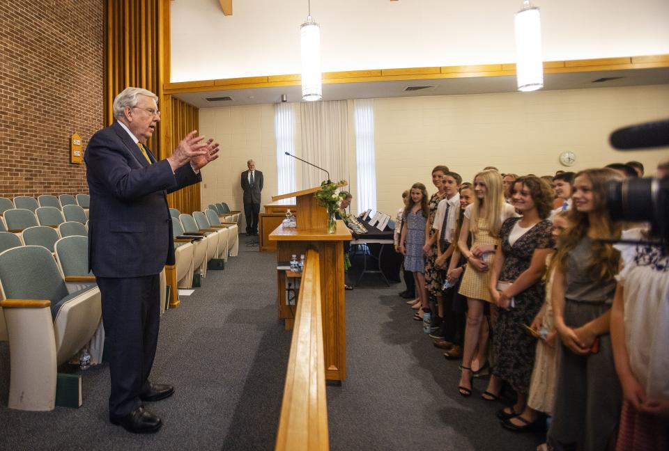 President M. Russell Ballard talks with the large gathering of young men and women during a multi-stake youth fireside in Georgetown, Massachusetts.