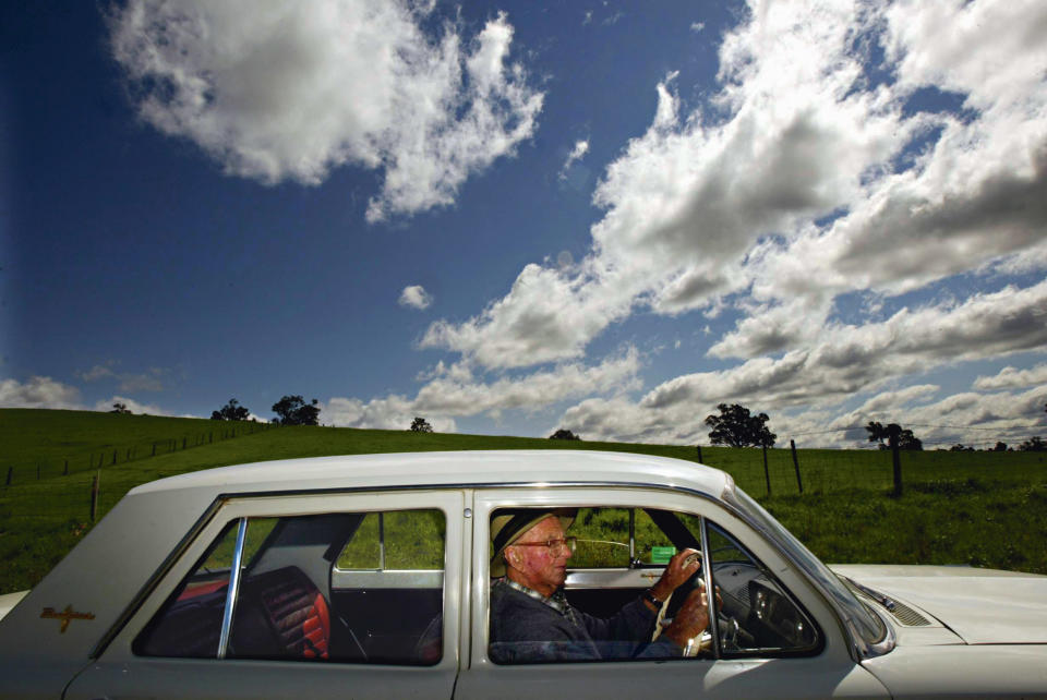 (AUSTRALIA OUT) 103 year old Jim Byrnes with his EH Holden Premier. Mr. Byrnes, who lives in Mudgee, has just successfully sat for his drivers licence again, 29 September 2005. SMH Picture by STEVEN SIEWERT (Photo by Fairfax Media via Getty Images/Fairfax Media via Getty Images via Getty Images)