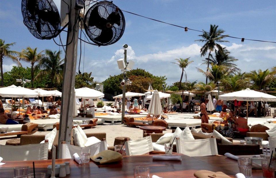 <p>Nikki Beach is a <a href="https://www.thedailymeal.com/nikki-beach-restaurant-and-club?referrer=yahoo&category=beauty_food&include_utm=1&utm_medium=referral&utm_source=yahoo&utm_campaign=feed" rel="nofollow noopener" target="_blank" data-ylk="slk:South Beach landmark;elm:context_link;itc:0;sec:content-canvas" class="link ">South Beach landmark</a>, and one of its most elite luxury beach clubs. Relax in private cabanas if you need a break from the festivities during the daytime, and cool off with a cold glass of wine during Rośe Saturdays. This sprawling, non-stop party is literally on the beach, with resident and guest DJs turning it up when the nighttime hits.</p>