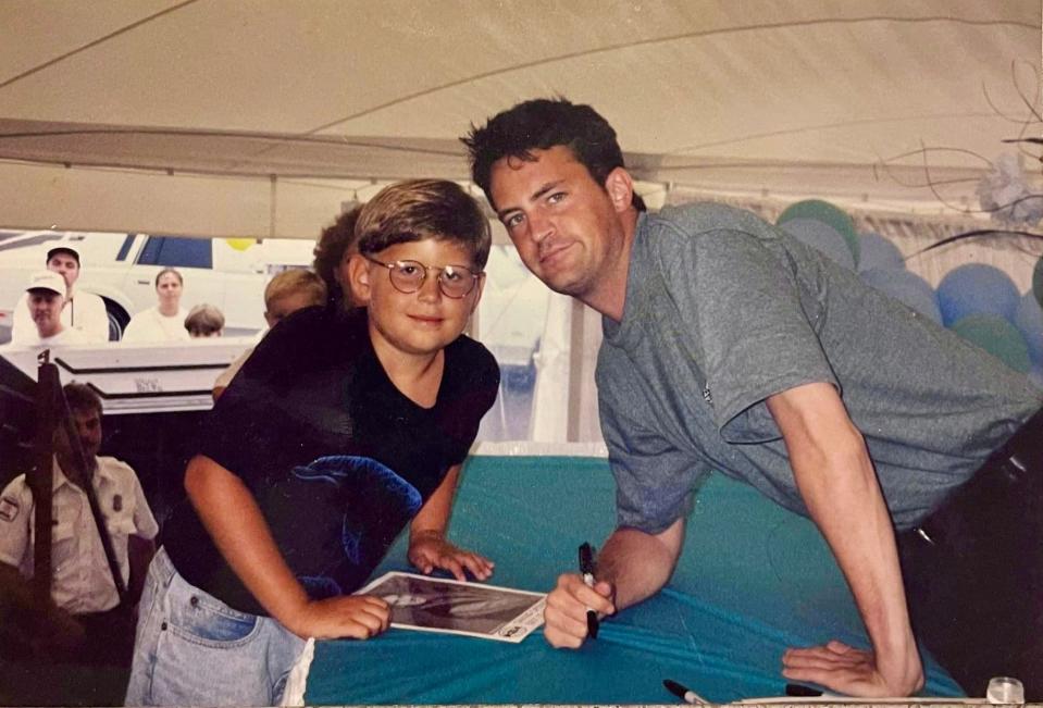Smyrna native Matt O'Neal with late "Friends" star Matthew Perry at the grand opening of Tanger Outlets near Rehoboth Beach on July 22, 1995.