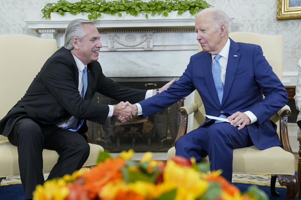 President Joe Biden meets with Argentina's President Alberto Fernandez in the Oval Office of the White House in Washington, Wednesday, March 29, 2023. (AP Photo/Susan Walsh)