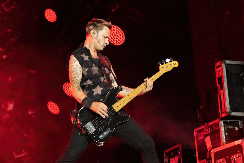 Bassist Mike Dirnt of Green Day performs during the Formula One U.S. Grand Prix on Oct. 21 at Circuit of the Americas.