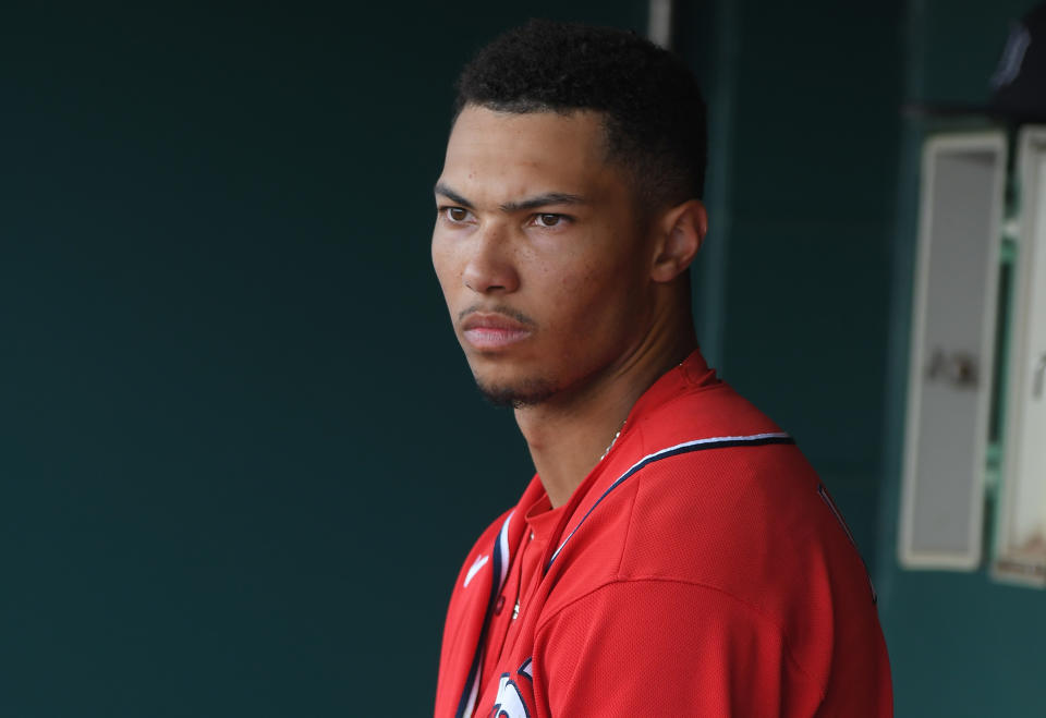 Daylen Lile tumbled headfirst over the outfield wall while trying to make a catch on Saturday afternoon, and had to be stretchered off the field.