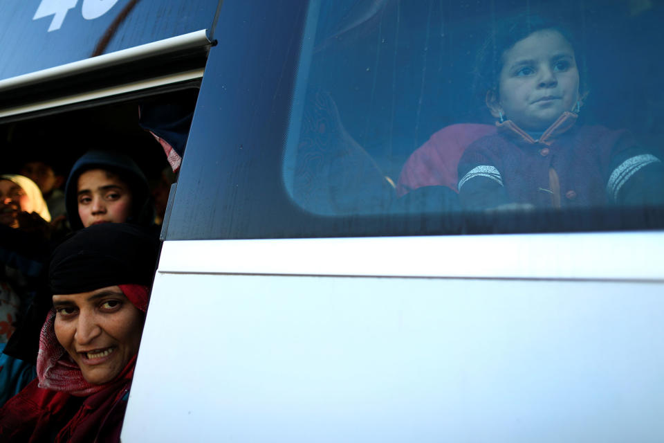 <p>People who just fled a village controlled by Islamic State fighters wait in a bus before heading to the camp at Hamam al-Alil, south of Mosul, Iraq, Feb. 22, 2017. (Zohra Bensemra/Reuters) </p>